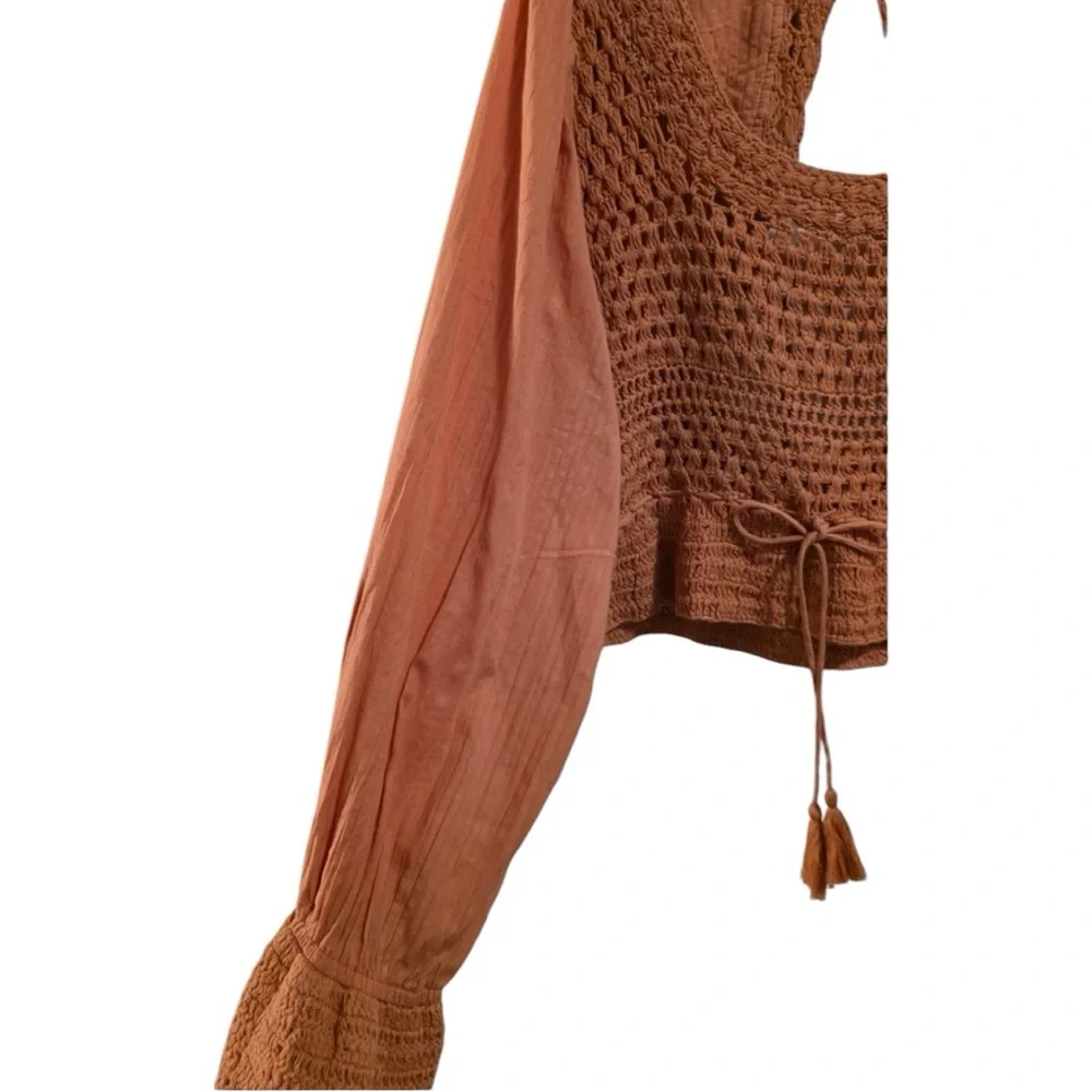 Free People Megan Long sleeves cut out back Crochet crop Top size Large